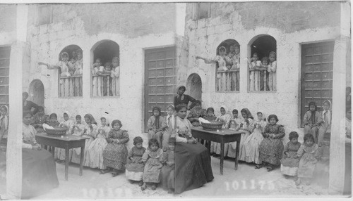 A sewing class at Lydda, Palestine