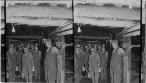 Miners coming our of cage or carriage in the mine to start their daily work. Scranton, Pa