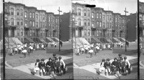 Playground. One block of street roped off at noon. Chicago