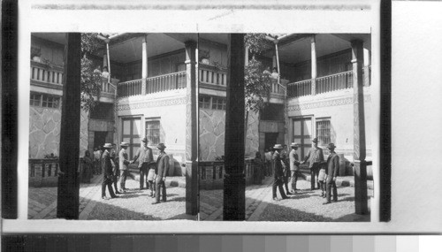 Greeting guests in the patio (inner court) of hospitable Hotel California, Riobamba, Ecuador