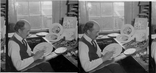 Mr. W. M. H. Morley one of the finest china painters in U.S. painting orchids on a service plate. "Lenox Inc." makers of fine chinaware, Trenton, N.J