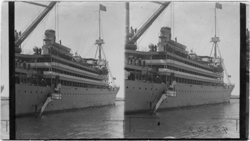 Hoisting Mrs. Harding and Mrs. Work, wife of Sec'y Work and Cap't. Andrews aboard U.S.S. Henderson, Metlakatla, Alaska