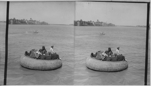 Peculiar round boats called “Kufas” on the Tigris River and Bagdad. Mesapotamia