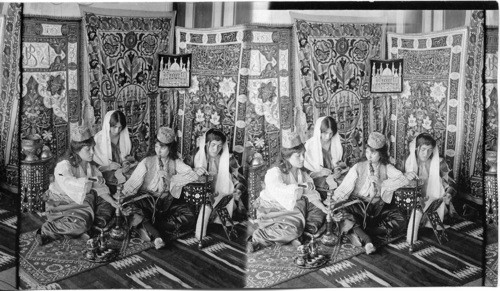 Turkish girls at home smoking, gossiping and reading poetry, Turkey