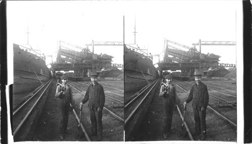 North along eastern ore docks, Conneaut Creek - stock piles on right. Cleveland, Ohio