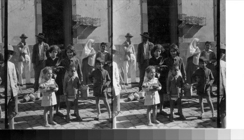 Market, Las Palmas, Canary Islands. Marketplace. "Chico" wanted to me to buy his "gallina" chicken) so he could buy "leche helado" (ice cream) for the crowd. Pandho and Guillermo are the other two boys