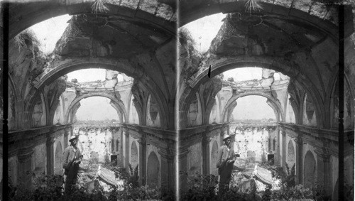 Her strong arches and mighty columns crushed by seismic power, Church of Capuchius, Guatemala. C.A