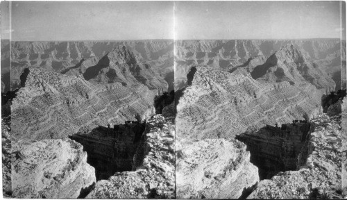 From Precipee Pt. (on No. Rim of Grand Canyon) S.E. to Vishnu Temple at extreme right- above Vishnu in distant hazy horizon is Mt. Humphrey of the S.F. Peaks