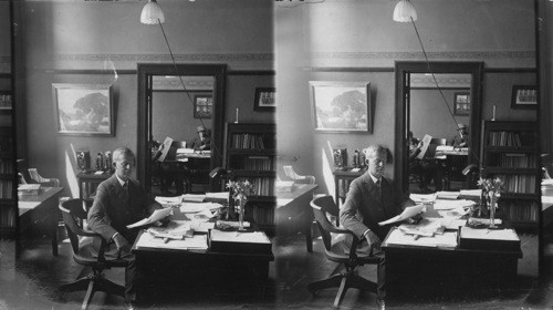 Principal F.L. Morse in office, Harrison Tech. H.S., Chicago, ILL