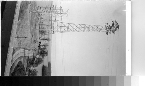 TVA [Tennessee Valley Authority] - Transmission tower and lake above the Wilson dam at Florence, Ala
