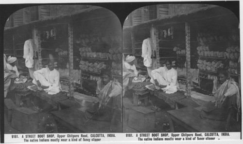 Inscribed in recto: 9161. A STREET BOOT SHOP, Upper Chitpore Road, CALCUTTA, INDIA. The native Indians mostly wear a kind of fancy slipper