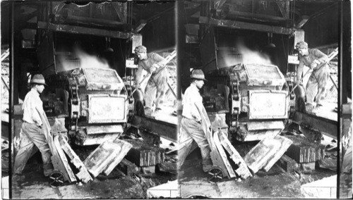 Pouring Copper into steel molds on chainless machine International Smelter, Miami, Ariz