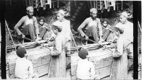 An oriental turning lathe - a chair-maker at work, Damascus, Syria