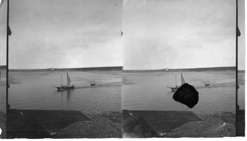 Fishing trawler, entering harbor, Causo, N.S. Canada