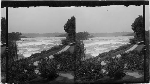 The American Rapids and new Bridge to Goat Island, Canadian side in the distance, N.Y