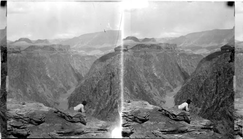 The Colorado River with banks of solid granite 1000 ft. high. Grand Canyon. Arizona