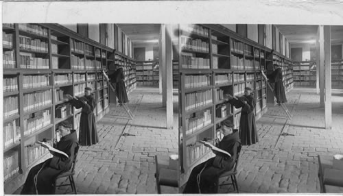 Monks at their studies in the library of old S. Francisco Convent. Lima, Peru