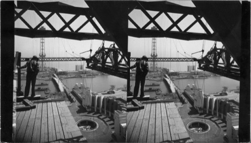 Construction is being rushed for the opening of the World's Fair, June 1st. Looking from the 240 foot level of the western skyride tower eastward across the lagoon to the Electrical Unit Buildings, below the North Colonnade of the Hall of Science and the circular opening for the ornamental fountain fronting it, Century of Progress, Chicago, Ill