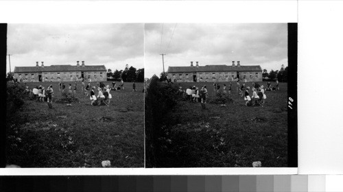 Near Mitchelstown: modern public school with the children at recess in the school yard