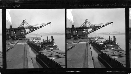 Loading a Freight Barge. St. Louis, Mo