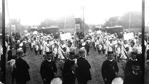 Class of 1904 dressed as jockies (jockeys) - marching to the baseball field. New Haven, Connecticut