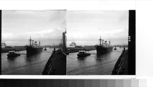 Great Britain, Scotland Clyde River: the "Nuddea" passing on the port of a westbound ship. she is on her way up the busy Clyde River to a berth in the harbor where she will be loaded with cargo before setting off on her maiden voyage. the Clyde river below Glasgow is under the control of Clyde Navigation Trust whose annual revenue of well over a million pounds is used in dredging, embarking, deck-building and repairing. today the Clyde River is a clear deep waterway but it was not always thus. 200 years ago it was a winding stream, wide but shallow, and it takes constant care to maintain the channel for the hundreds of ships that sail its waters