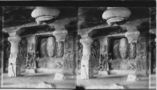 The Trimurti or Three-faced Bust of Shiva, 19 feet high Elephanta Cave near Bombay, India