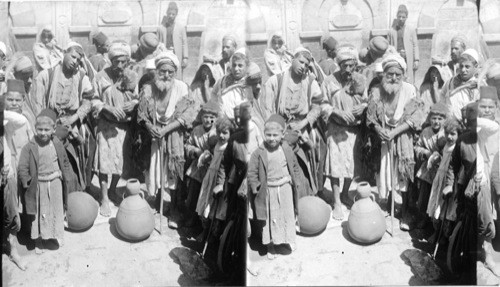 Group at a fountain, probably in Damascus. Syria