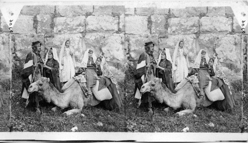 A party from Bethlehem by the walls of old Jerusalem. Palestine