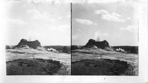 Crater of Castle Geyser, "Old Faithful" in Distance