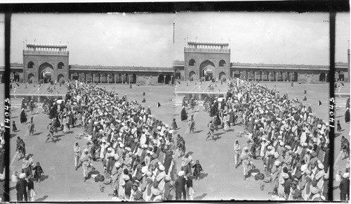 Assembling for prayer, multitudes of devout Mohammedans in the Courtyard of the Jumma Mosque, Delhi, India