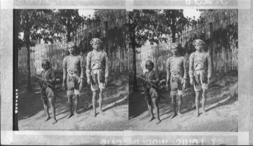 Three Handsome members of the Bagdos Tribe in the Philippine Village, St. Louis World's Fair