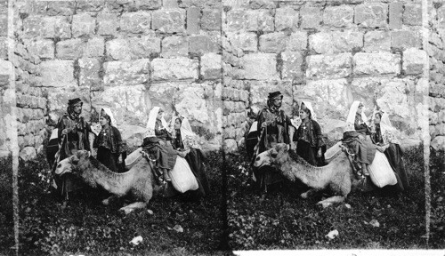 A party from Bethlehem by the walls of old Jerusalem. Palestine