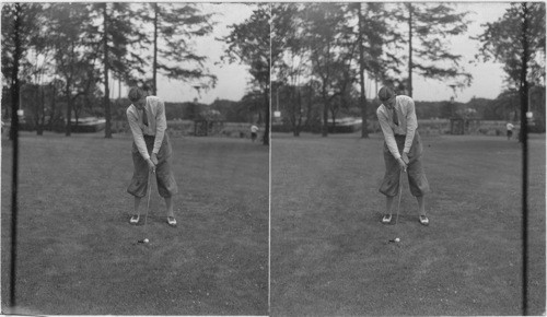 Horton Smith. Addressing the ball with a wood club