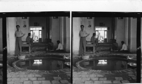 147 Interior of a teahouse with water pool (air conditioning idea). Temperature outdoors that day was 112, indoors about 86