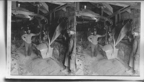 Filling the sand buckets to go by cable over mountain to marble mill. Vermont