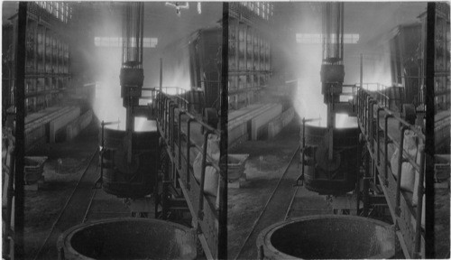 Open Hearth Furnace pouring Molten Metal into ladle. Ford Motor Plant, Detroit, Mich