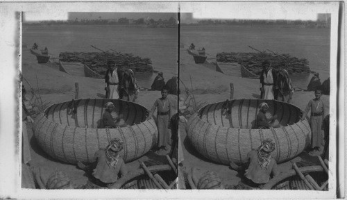 Building the peculiar round Boats called “Kufas,” on the Tigris River, at Bagdad. Mesopotamia. Asia