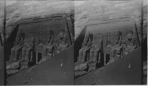 Colossal statues of Ramses II, cut in solid rock at Temple entrance - Abu Simbel. Egypt