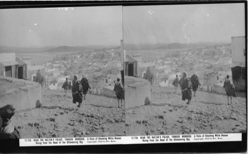 Inscribed in recto: 17,710. NEAR THE SULTAN’S PALACE, TANGIER, MOROCCO. A Vista of Gleaming White Houses Rising from the Head of the Shimmering Bay. Copyright 1912 by Geo. Rose