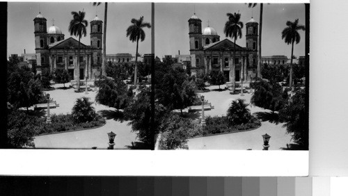 Cuba - Province of Matanzas - Cardenas: The Plaza Colon and the Cathedral. This is the main plaza of the second port city of the Province of Matanzas. Cardenas, on the Bay of Cardenas, is some 90 miles from Havana on the North shore of the Island. It is an important sugar loading port