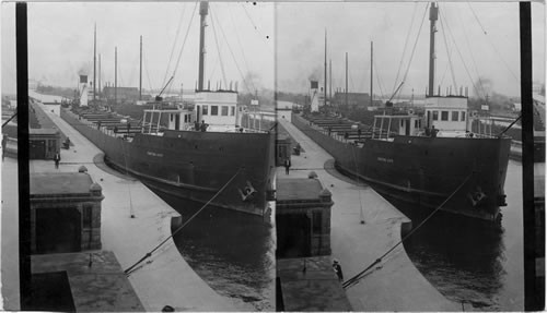 Steamers at highest level in Poe Lock - W. from north side of Power House, Sault Ste. Marie, Michigan