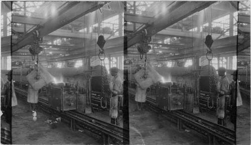 Pouring Molten Metal into Mold. Ford Motor Plant, Detroit, Mich