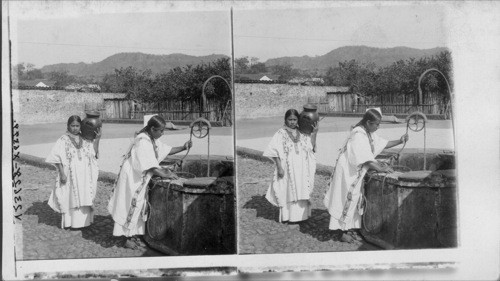 Aztec women at a public well, showing floor for drying corn, Amatlan. Near Cordoba. Mexico