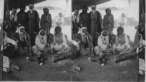 A powerful Bedouin Sheikh (center) and his hardy warriors in Old Moab. Palestine