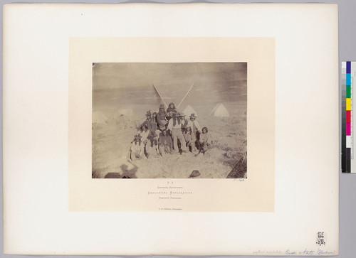 Buck and staff (Shoshones). [Shoshone Indians: group with flags]