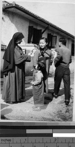 Maryknoll Sister visiting families, Guilin, China, ca. 1945