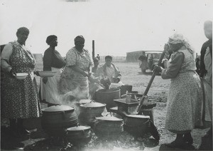 Women preparing the food for a Church feast