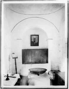 Baptistry with original font of hammered copper made by Mission Indians at Mission San Gabriel, ca.1908