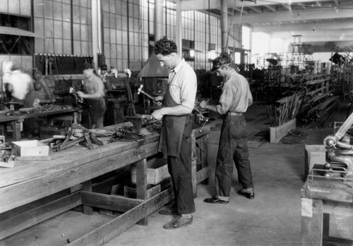 Men working with wrought-iron